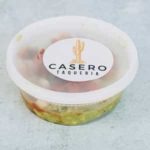 Eight-ounce container of house guacamole to go
