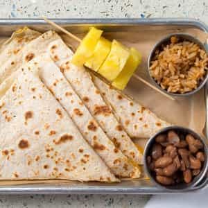 Kids quesadilla with rice, beans and pineapple