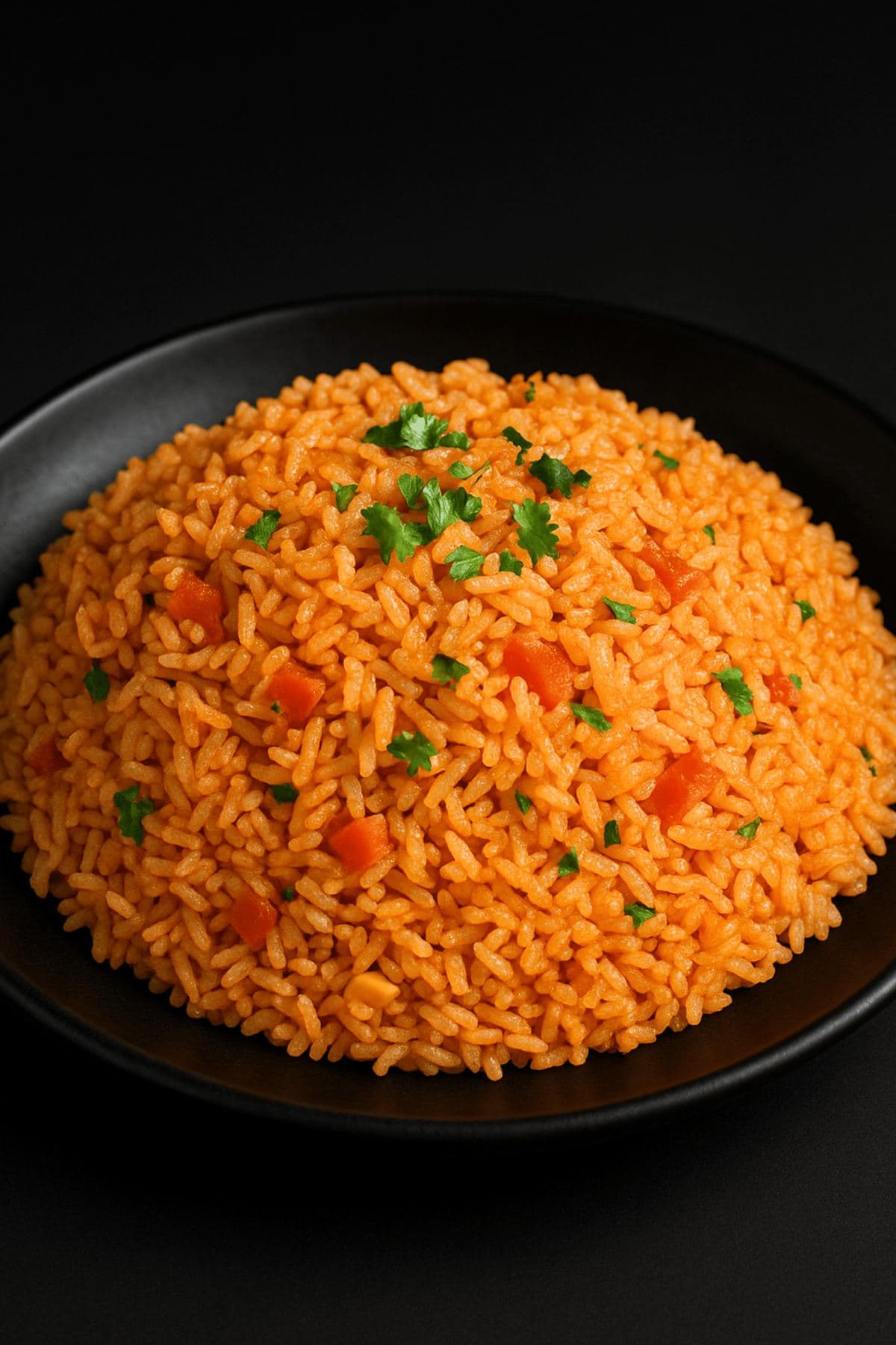 Bowl of Mexican red rice topped with green onion