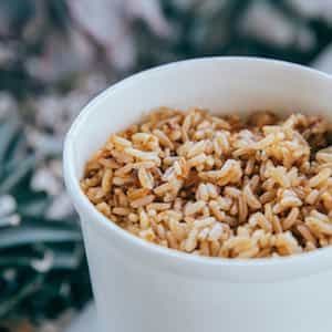 Side of Mexican rice in a to-go cup