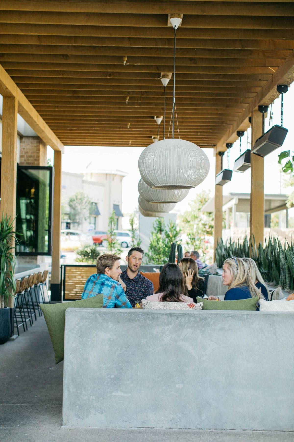 Guests dining on Casero's covered patio