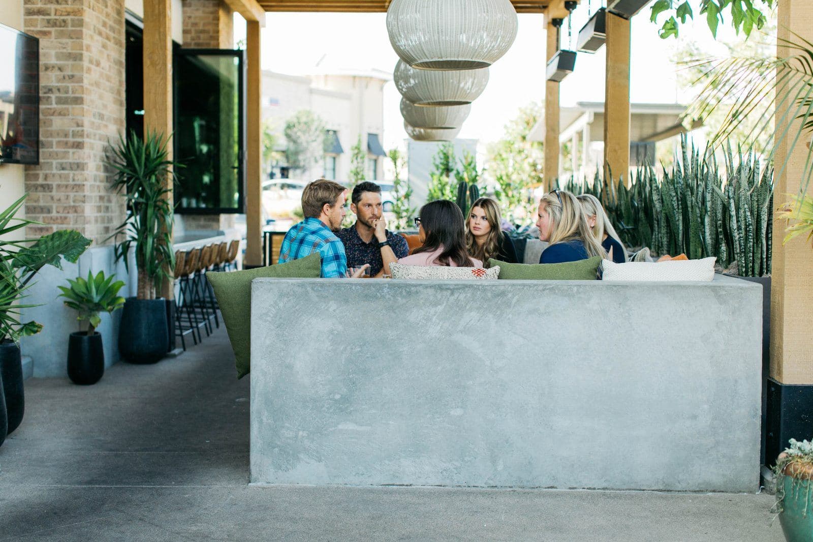 Guests relaxing in the patio lounge